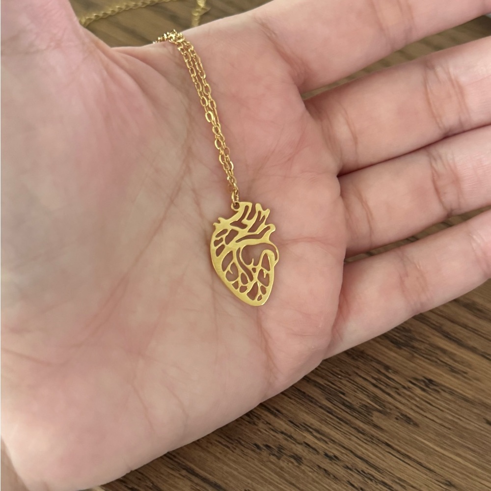 Human heart pendant chain